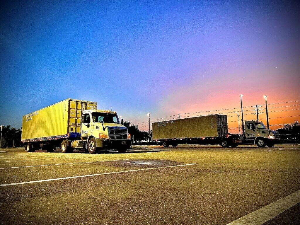 2 40' STORAGE CONTAINERS POSED AT DAWN